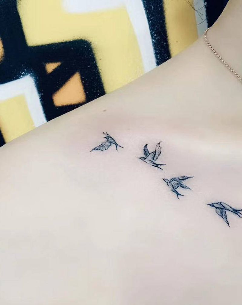 微写雨燕纹身图片_颈部欧美写实纹身图案