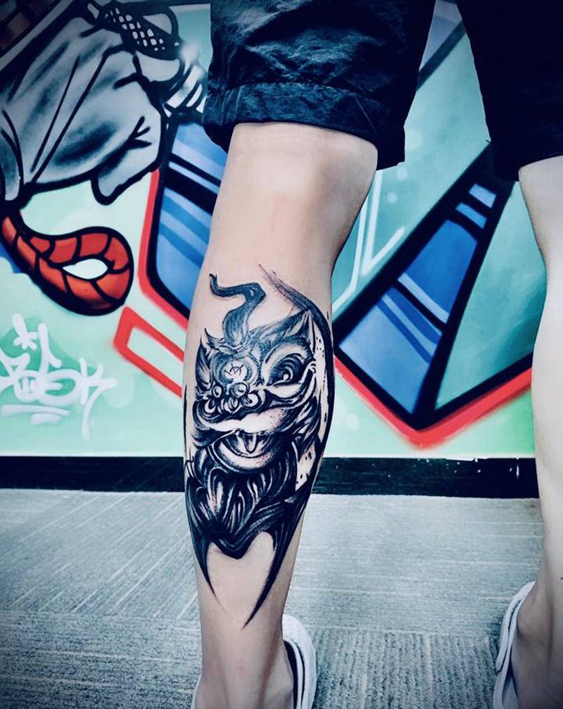 唐狮纹身图片_腿部水墨纹身图案