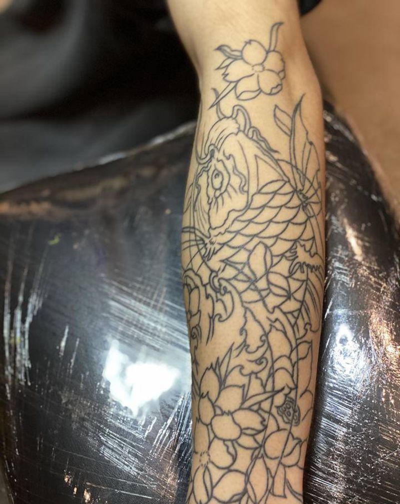 鱼纹身图片_手臂纹身图案