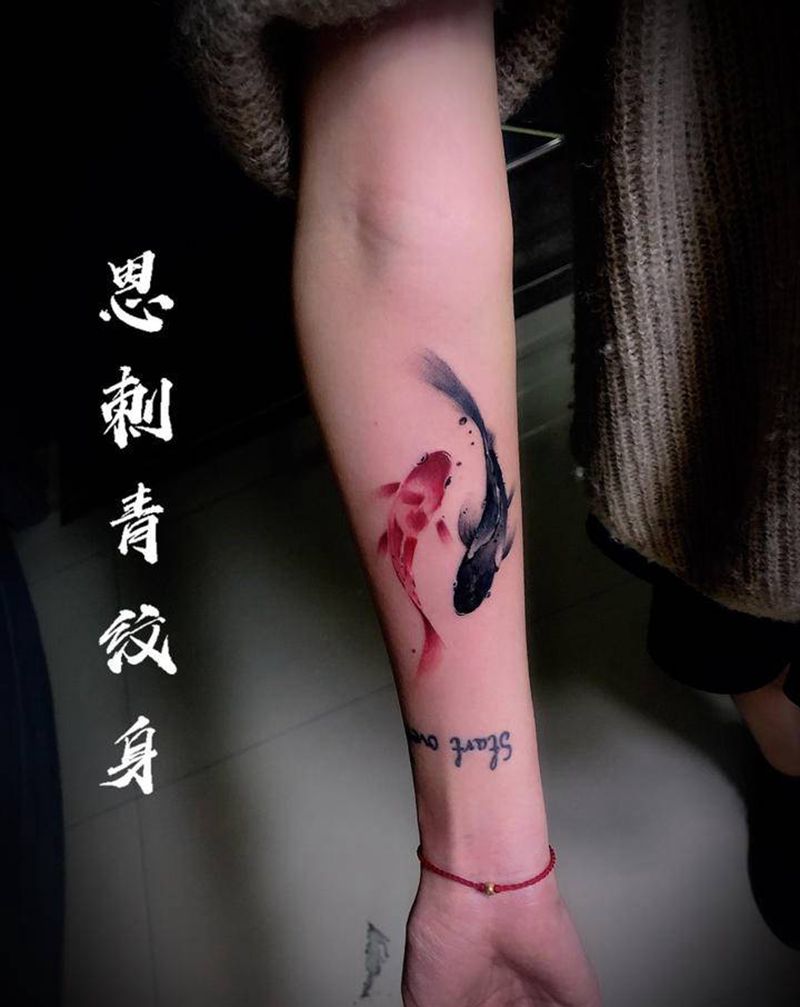 水墨·阴阳鱼纹身图片_手臂水彩水墨鱼纹身图案