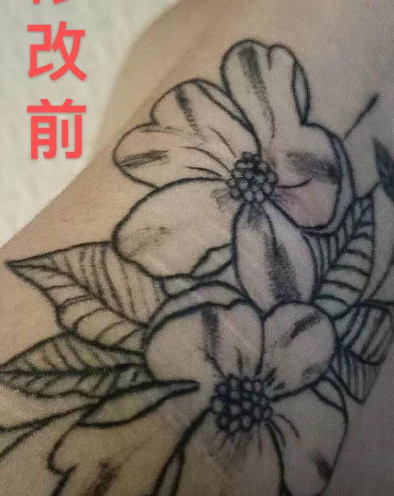 素花重生纹身图片_手臂点刺素花纹身图案