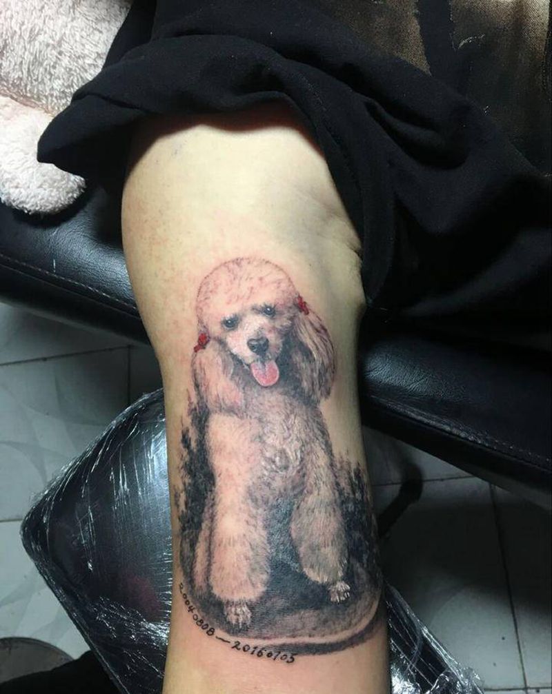 永远的陪伴纹身图片_手臂欧美写实纹身图案