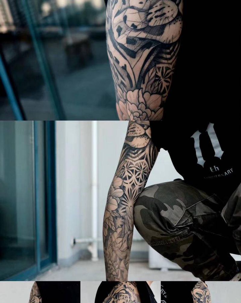 图腾点刺花臂纹身图片_手臂图腾点刺纹身图案