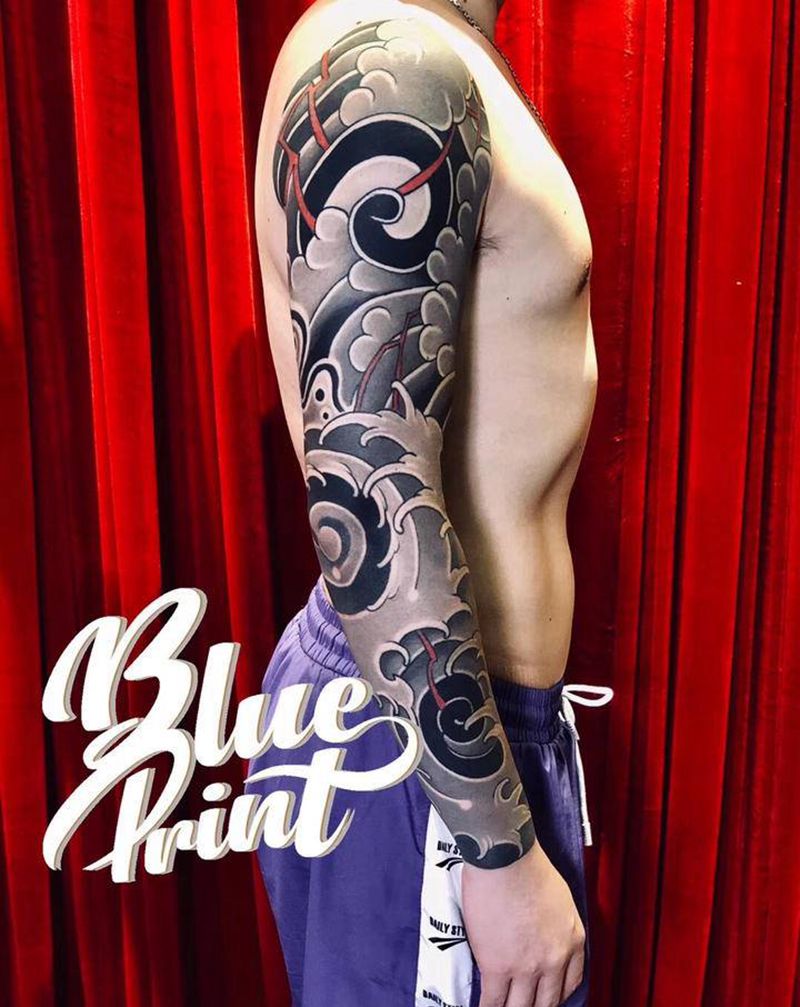 云浪花臂纹身图片_手臂老传统纹身图案