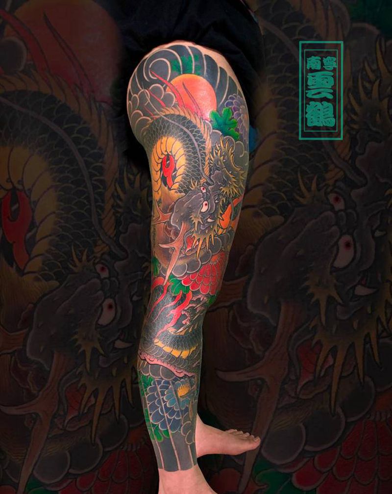 龙戏菊园纹身图片_腿部脚部老传统新传统龙纹身图案