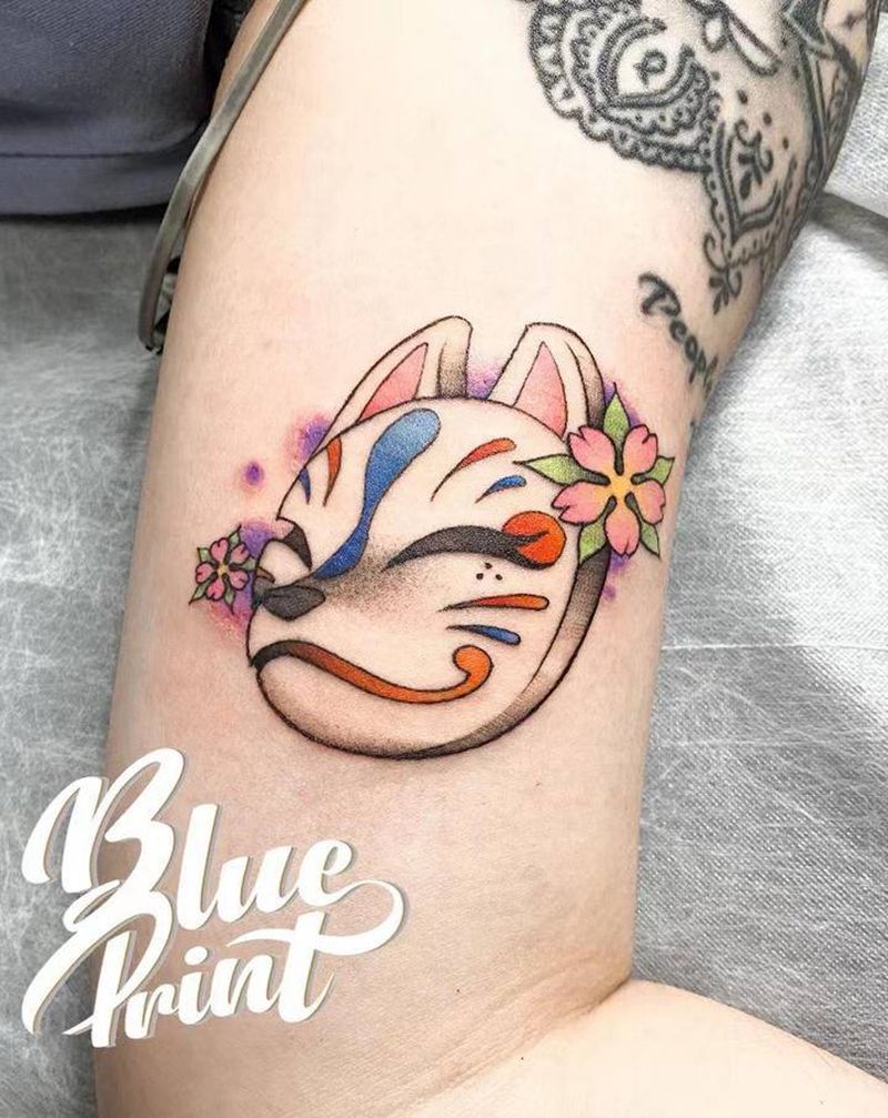 面具纹身图片_手臂老传统纹身图案