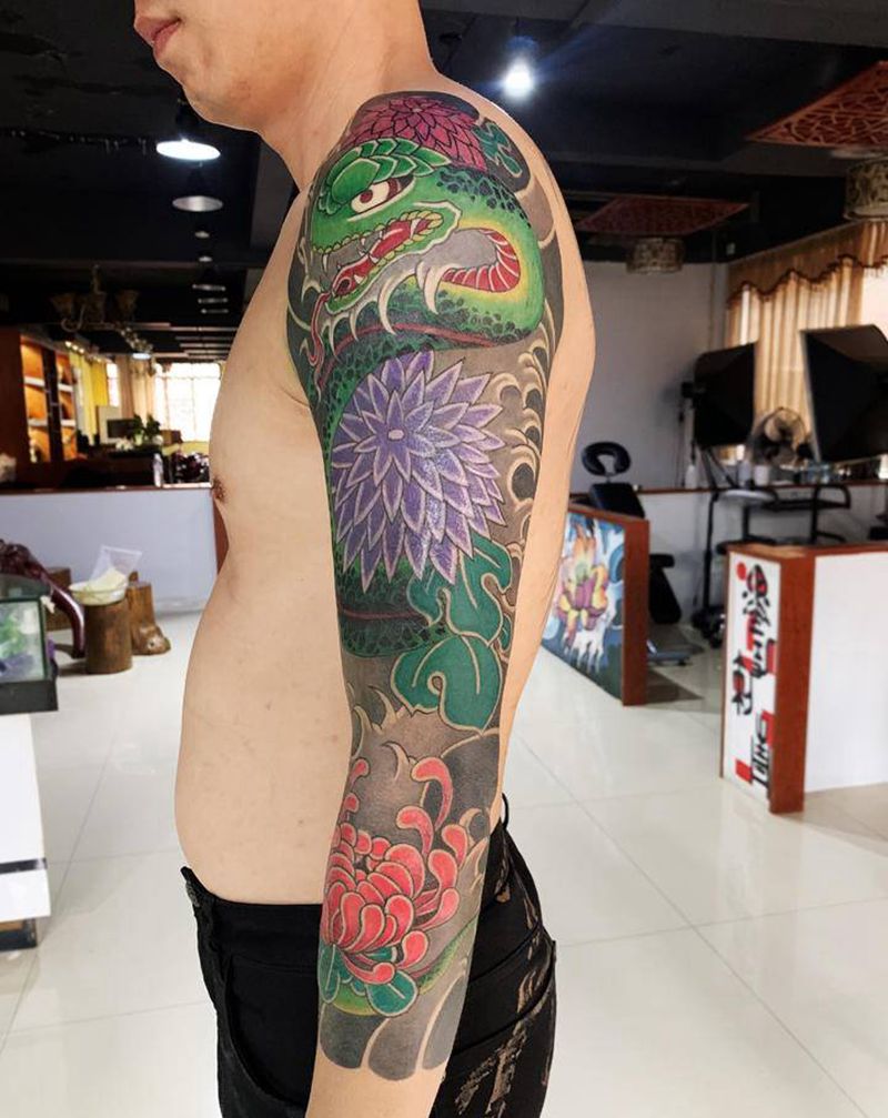 七分袖花臂纹身图片_手臂老传统纹身图案