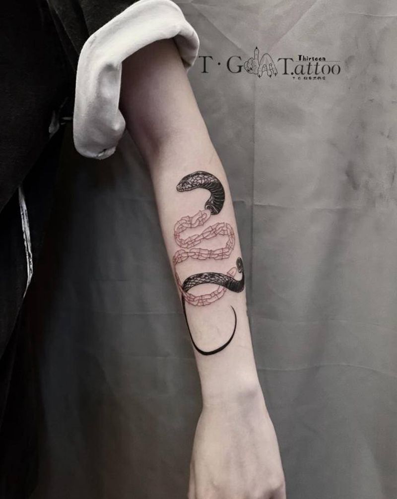 蛇纹身图片_手臂手部纹身图案