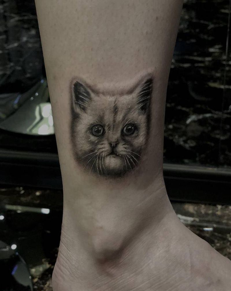 《写实小猫咪》纹身图片_欧美写实猫纹身图案