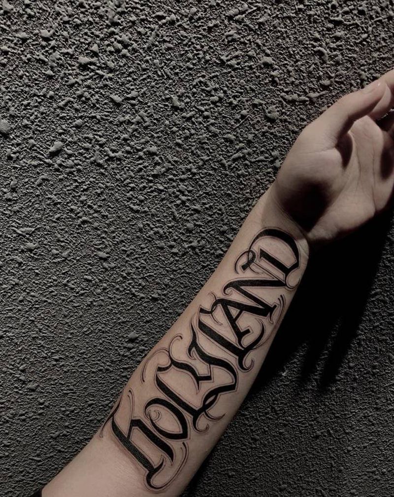 花体英文纹身图片_手臂花体英文纹身图案