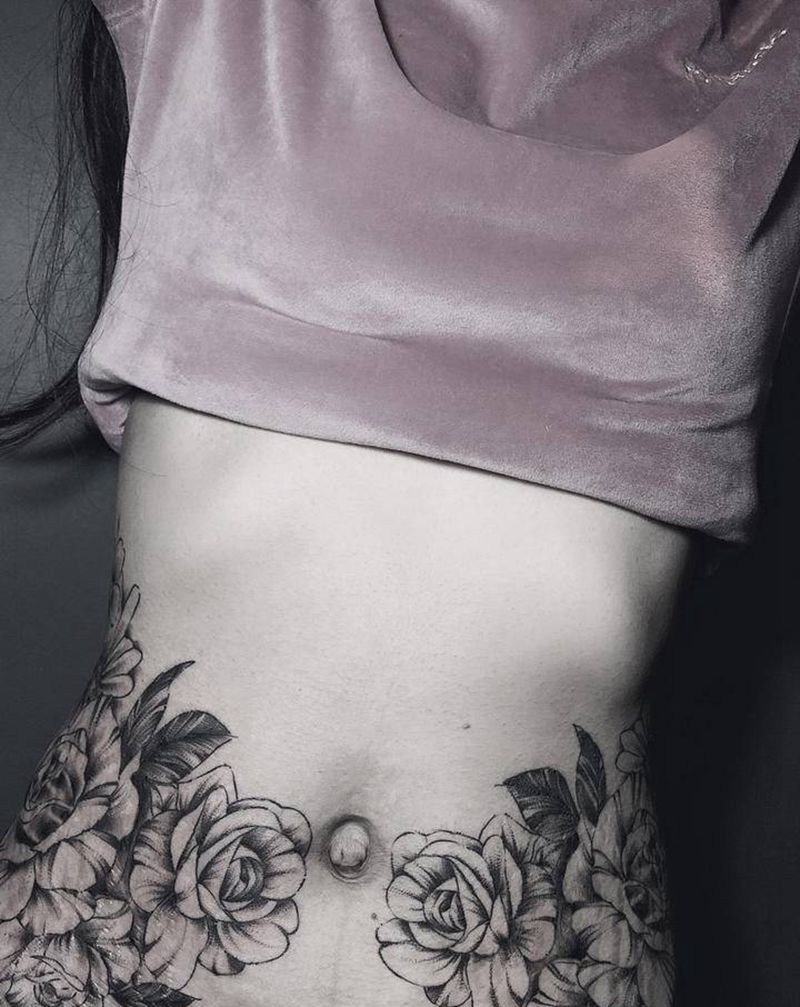 素花遮盖妊辰纹纹身图片_腹部纹身图案