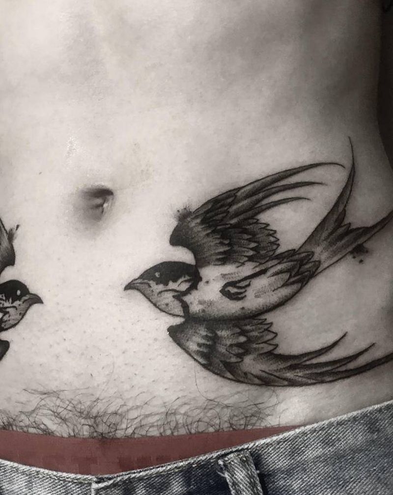 腰部燕子纹身图片_腹部点刺纹身图案