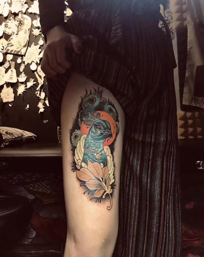 孔雀纹身图片_腿部脚部纹身图案