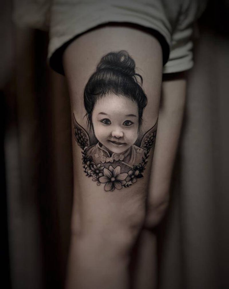 肖像纹身图片_腿部人物纹身图案