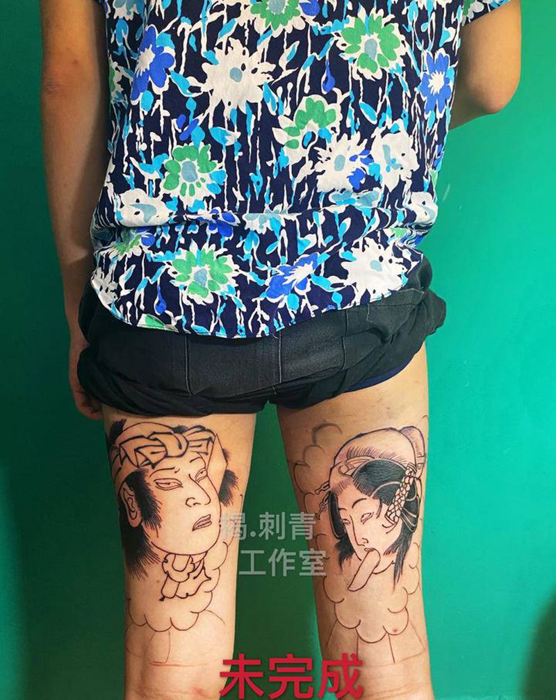 生首纹身图片_腿部老传统纹身图案