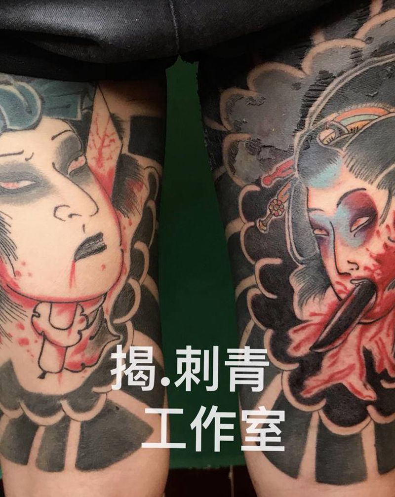 生首纹身图片_腿部老传统纹身图案