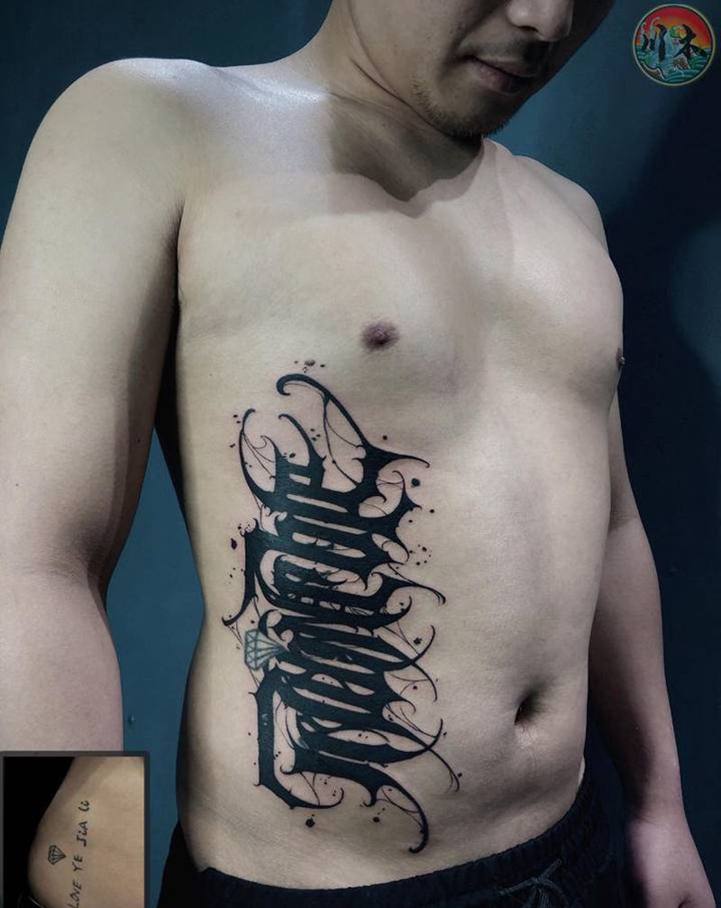 花体字遮盖纹身图片_腰部花体字纹身图案