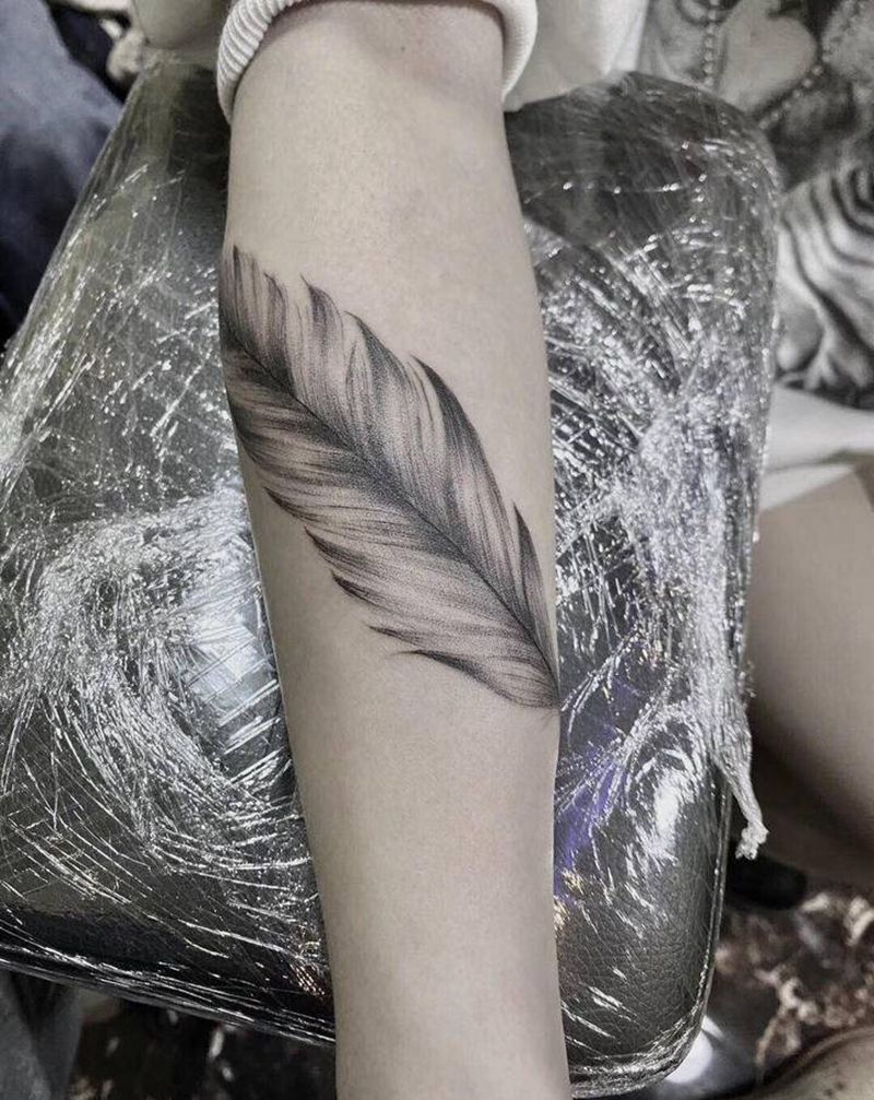 羽毛纹身图片_手部小清新纹身图案