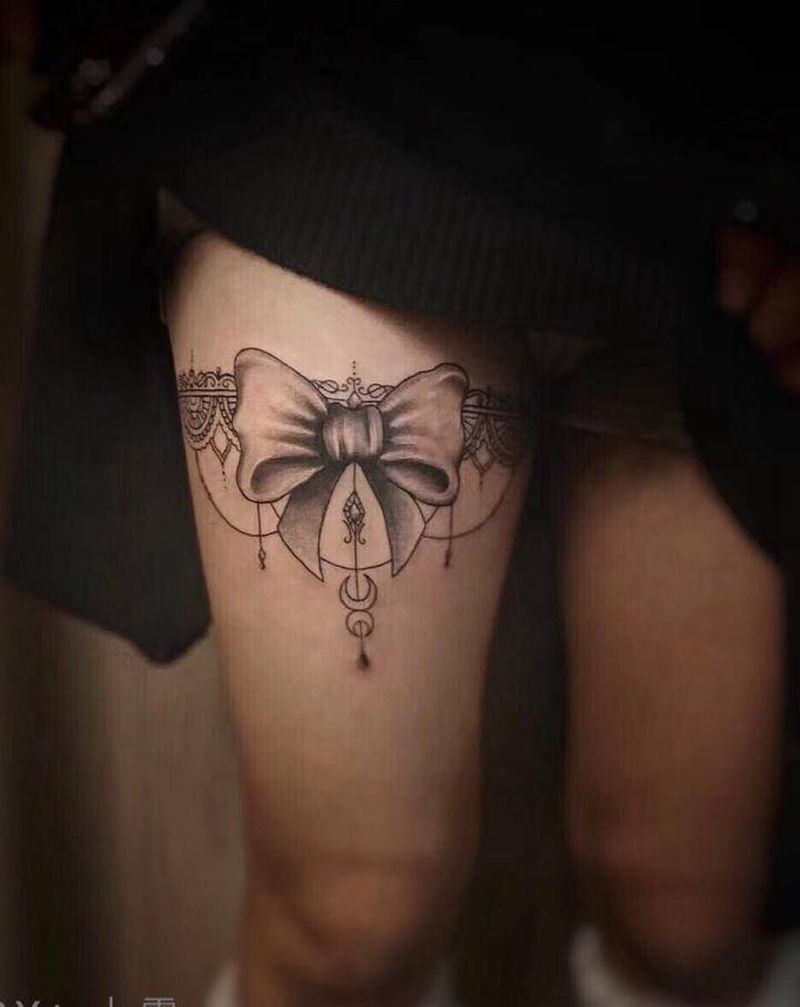 蝴蝶结纹身图片_腿部几何纹身图案