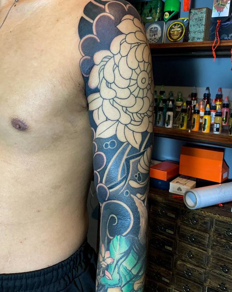 花臂进度纹身图片_手臂老传统纹身图案