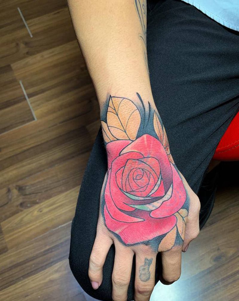 玫瑰覆盖纹身图片_手部纹身图案