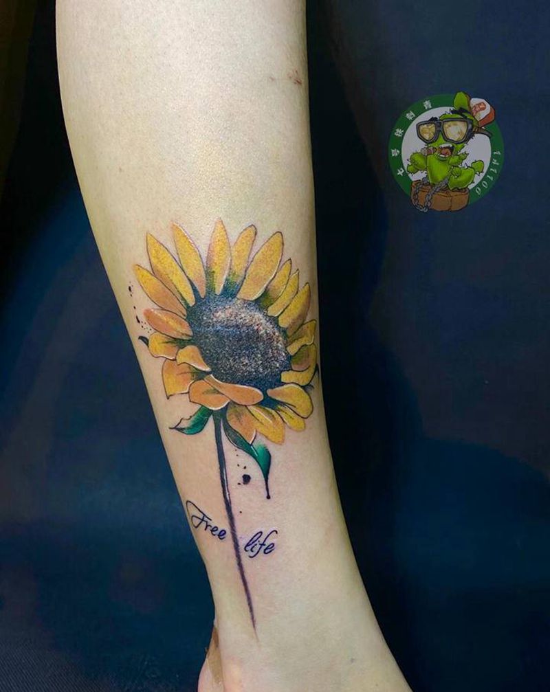 向日葵遮盖纹身图片_腿部纹身图案