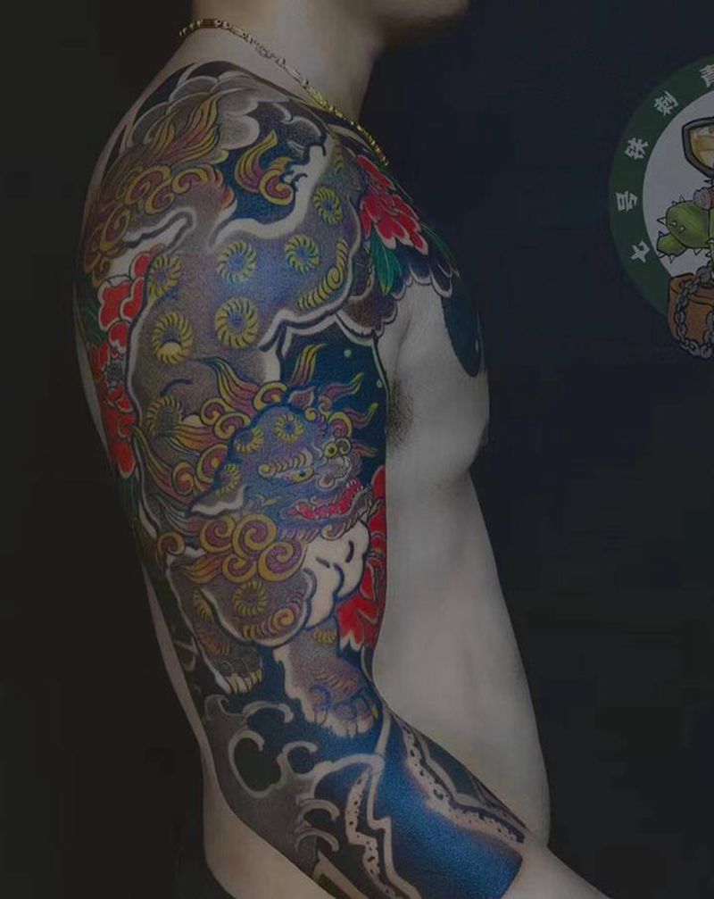 麒麟半甲纹身图片_手臂胸部老传统纹身图案