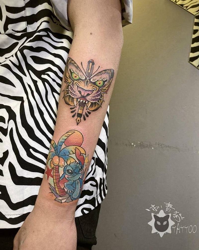 虎蝶和史迪仔纹身图片_手部手臂Old SchoolNew School蝴蝶老虎史迪仔纹身图案