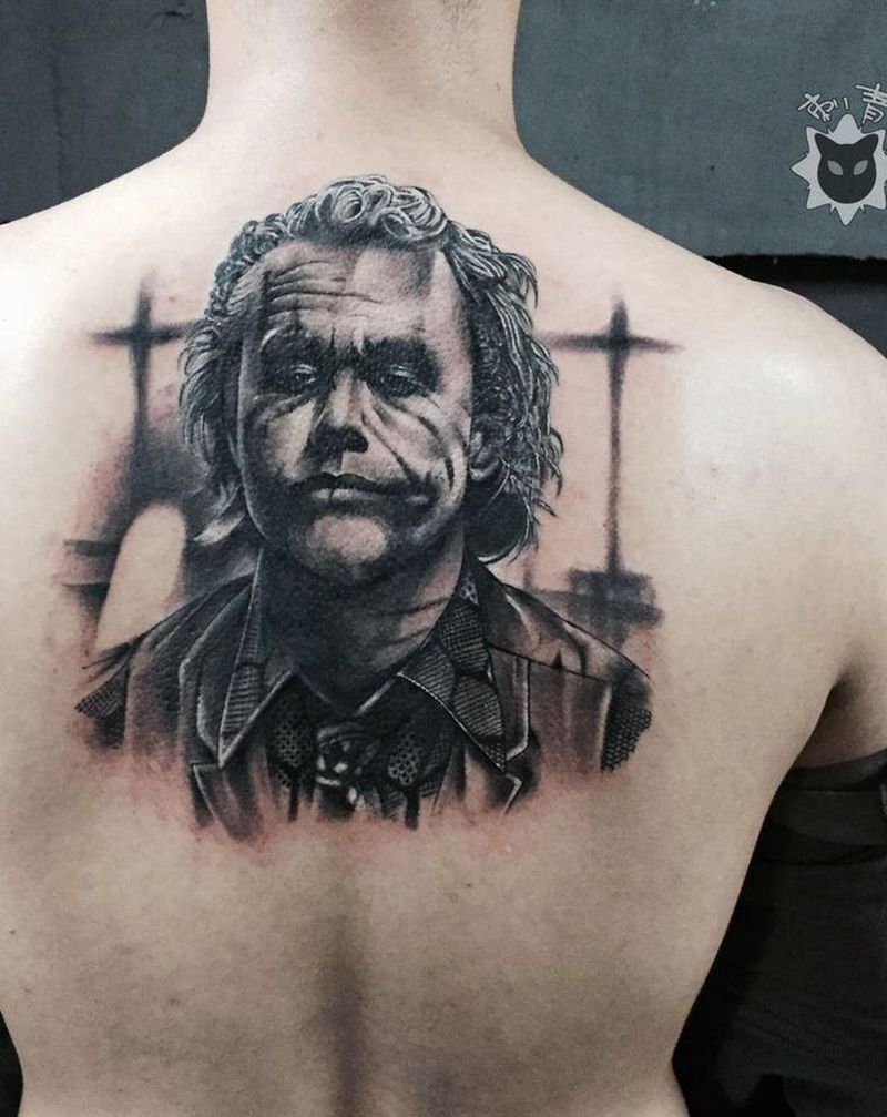 希斯.莱杰纹身图片_背部欧美写实New School小丑希斯莱杰纹身图案