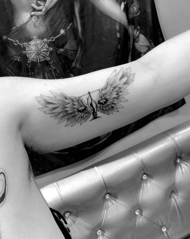 天秤纹身图片_手臂纹身图案