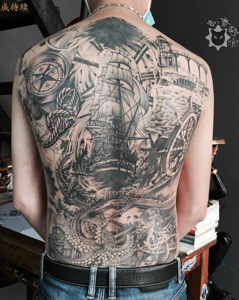航海纹身图片_背部欧美写实New School帆船章鱼指南针纹身图案