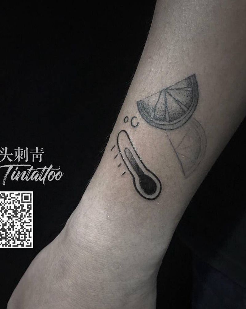 温度计和柠檬纹身图片_手臂点刺纹身图案