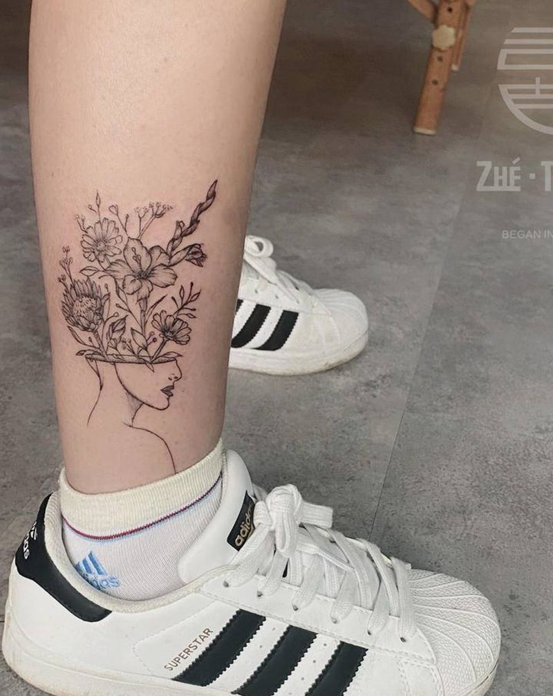 素花纹身图片_腿部纹身图案