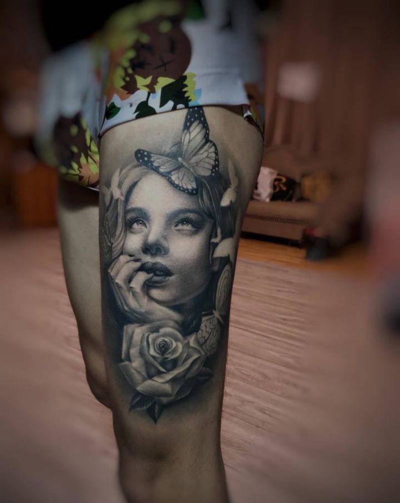 女人纹身图片_腿部欧美写实纹身图案