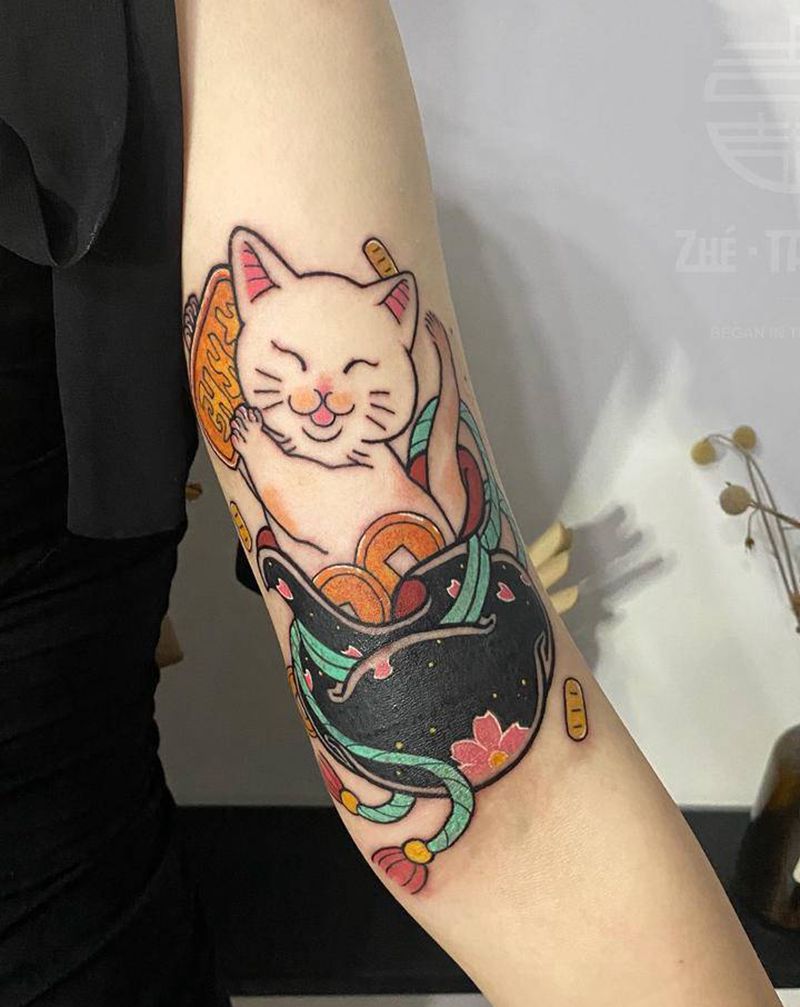 招财猫遮盖纹身图片_手臂纹身图案