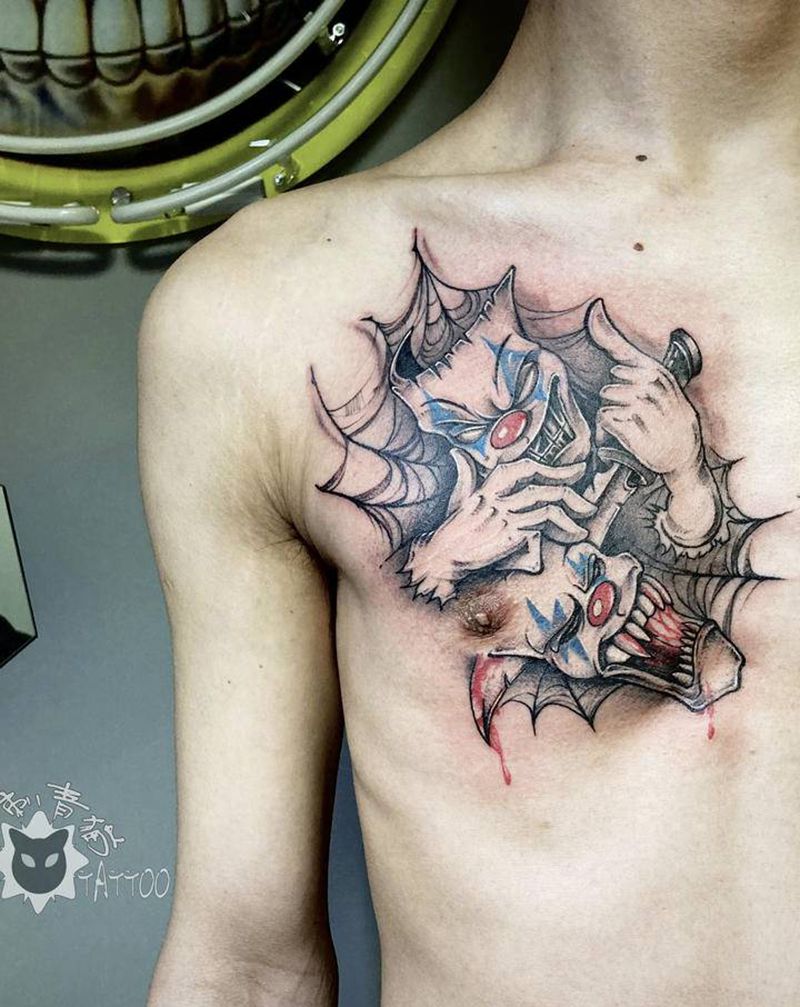 小丑纹身图片_胸部点刺小丑面具纹身图案