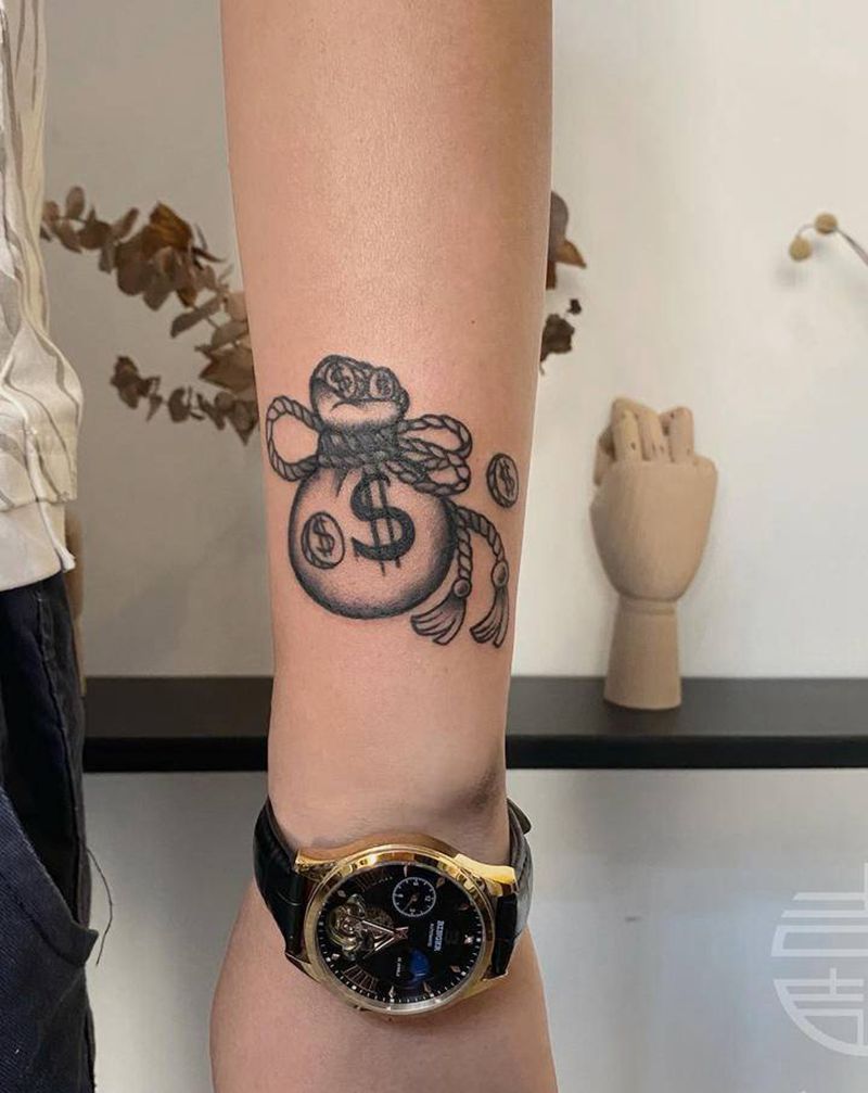 钱袋遮盖纹身图片_手部纹身图案
