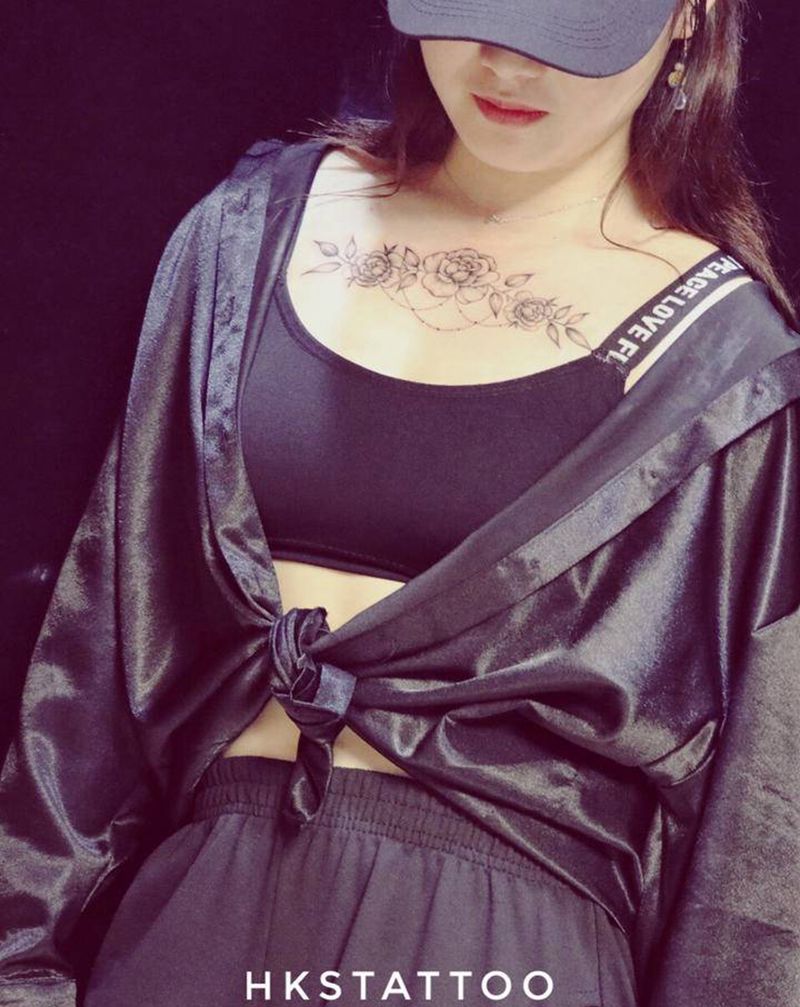 素花纹身图片_胸部新传统欧美写实纹身图案