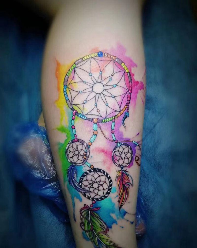 捕梦网纹身图片_腿部水彩纹身图案