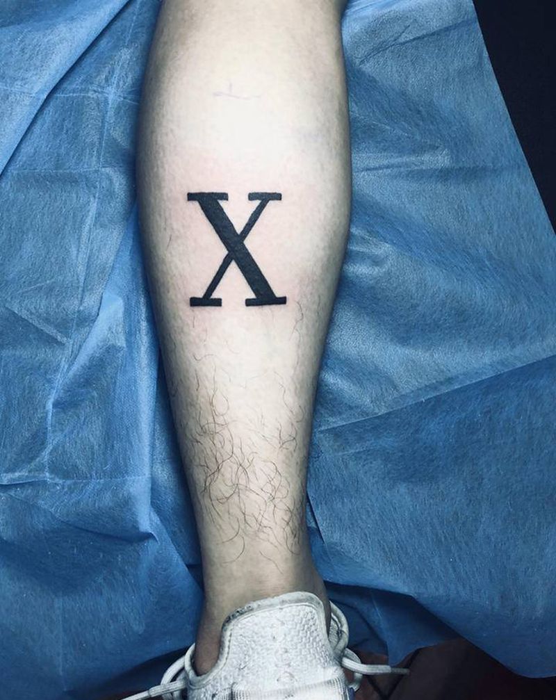 图腾X纹身图片_腿部图腾纹身图案