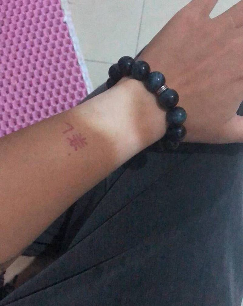 达摩蛋纹身图片_手臂新传统纹身图案