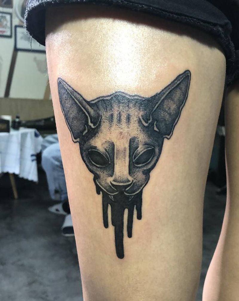 点刺猫纹身图片_腿部点刺纹身图案