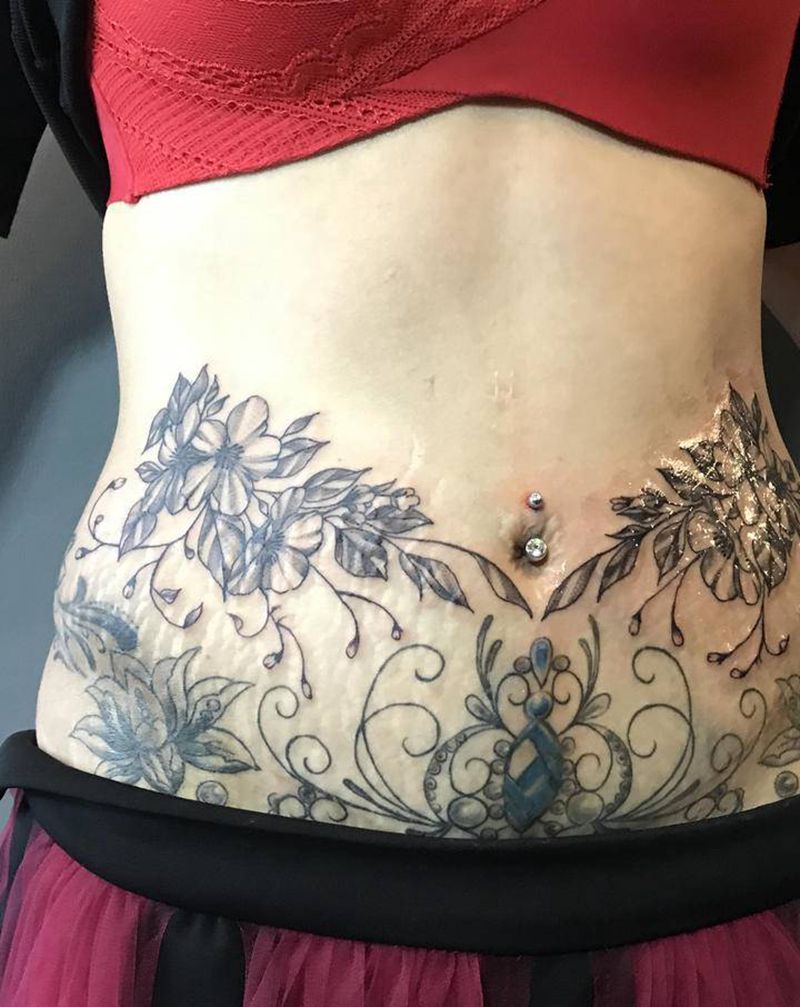 素花腰链上半部纹身图片_腰部点刺纹身图案