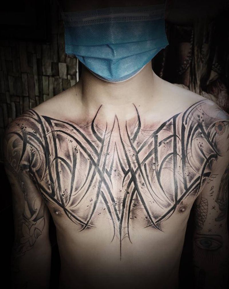 花胸纹身图片_胸部花体字纹身图案