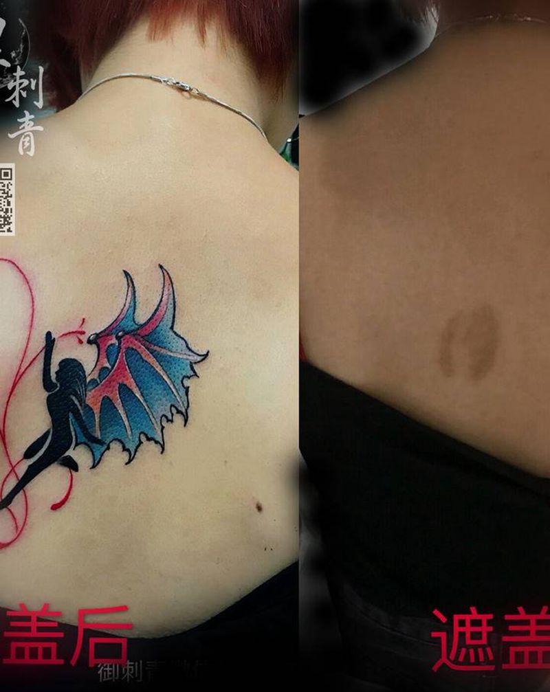 小精灵纹身图片_水彩纹身图案