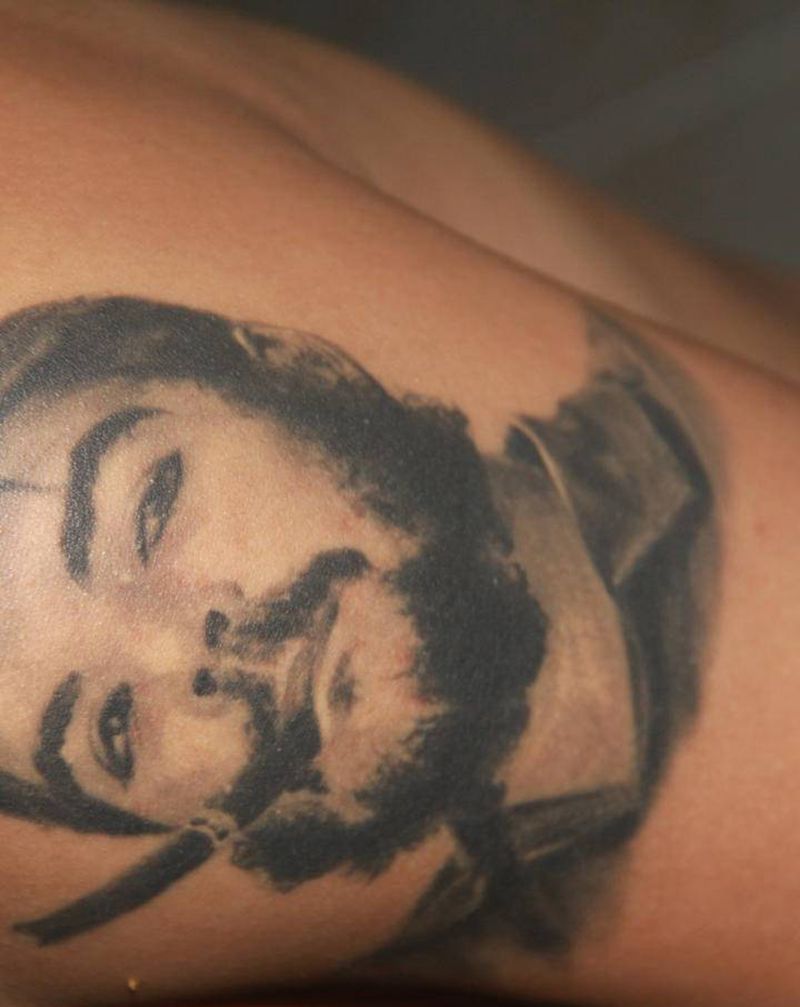 且格瓦拉纹身图片_手臂欧美写实纹身图案