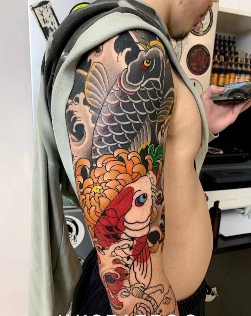 鲤鱼纹身图片_手臂老传统纹身图案