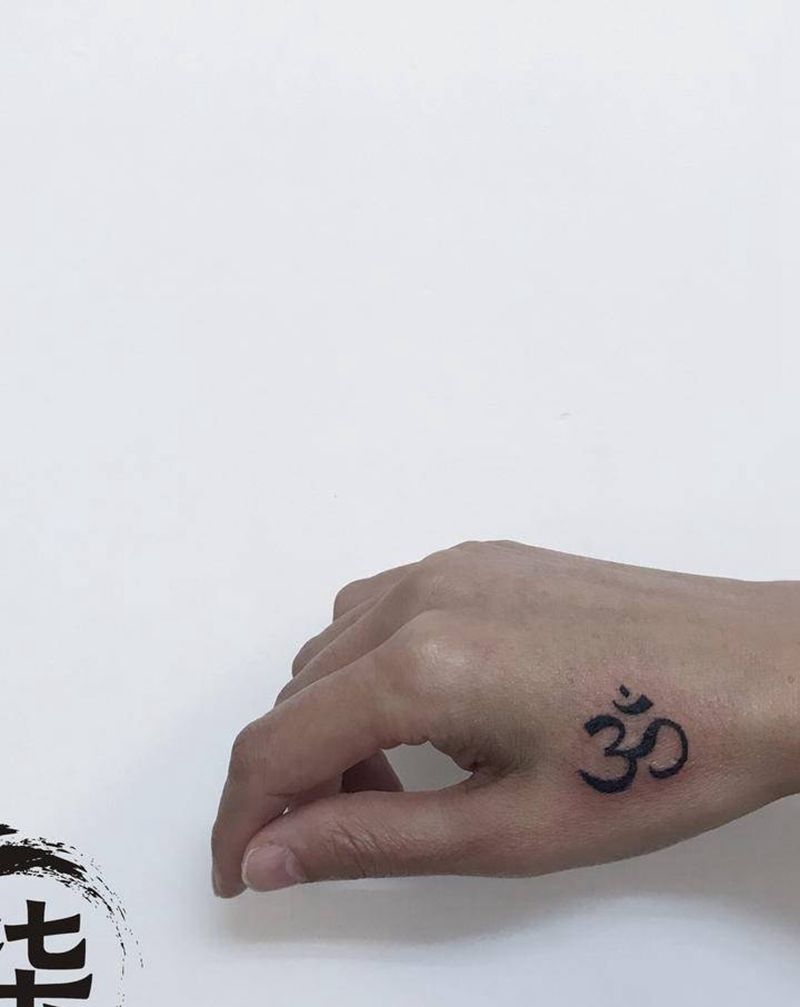 瑜伽标志纹身图片_手臂纹身图案