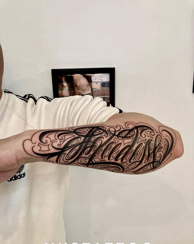 花体字纹身图片_手臂纹身图案