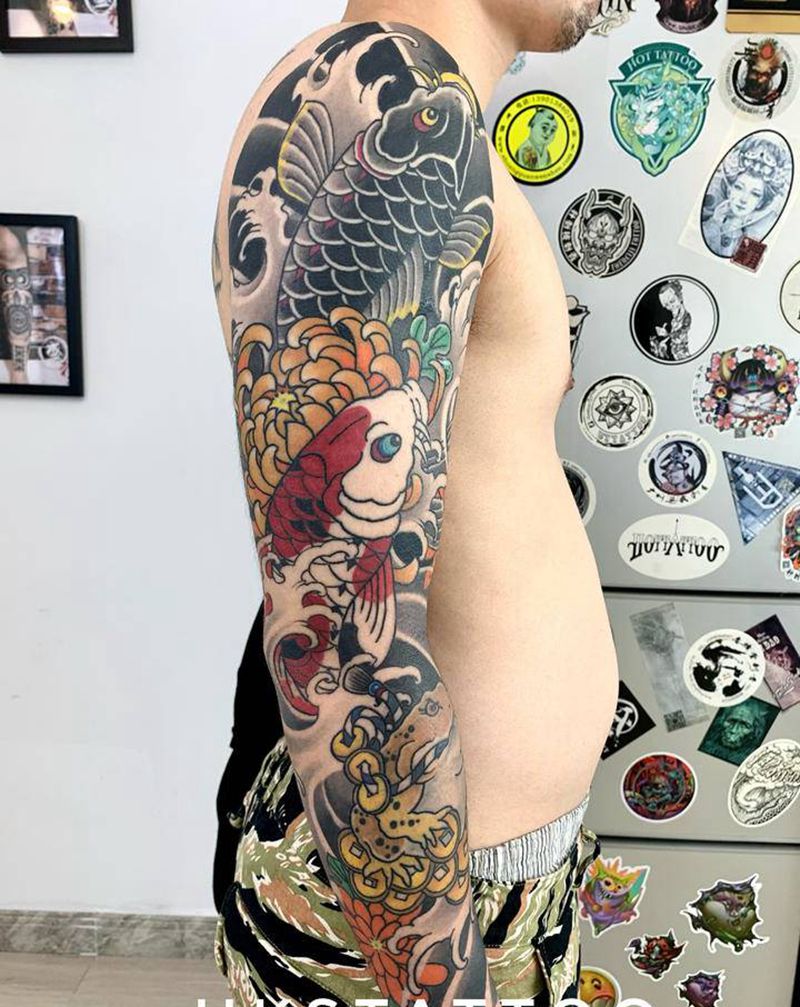 老传统鱼纹身图片_手臂老传统纹身图案